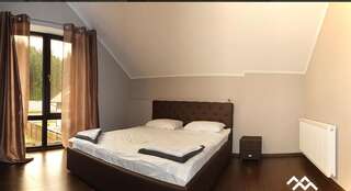 Дома для отпуска Berghaus Буковель Дом с 4 спальнями-9